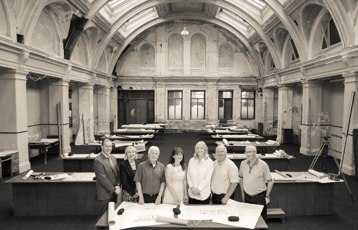Members of Titanic Foundation’s Executive Board and Chief Executive Kerrie Sweeney review the plans for the hotel project. (L-R Mark Beattie, Marie-Therese McGivern Sammy Douglas, Kerrie Sweeney, Nicky Dunn, Noel Rooney, Denis Power)